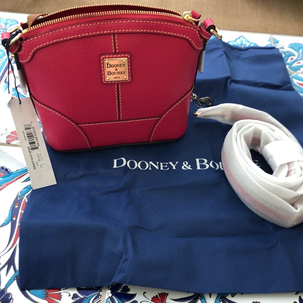 Dooney & Bourke pink crossbody purse.